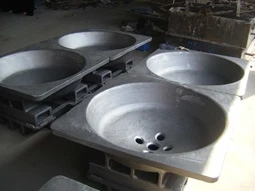 Vilka är de vanliga materialen som används för att tillverka avlopps- och slaggpanna?